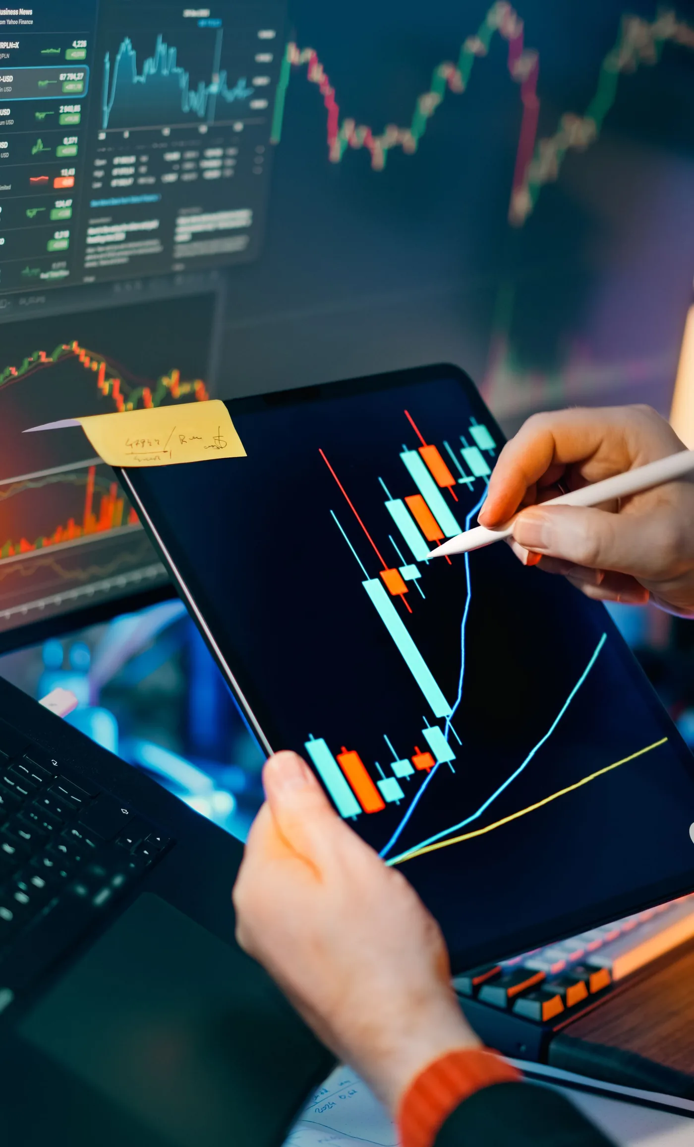 Analyst reviewing market research and financial signals on a laptop